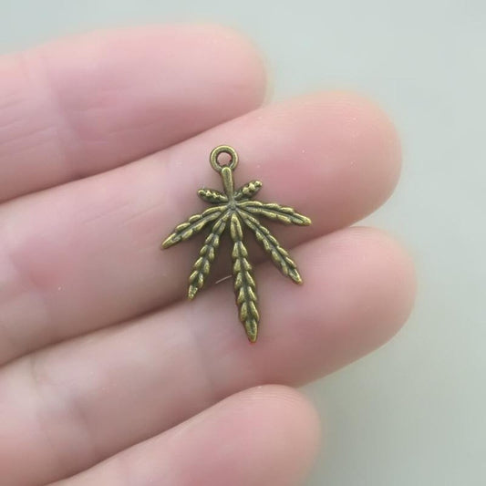 Weed charms, pot leaf pendants. Two sided. Antique bronze 18X24mm CM1624B