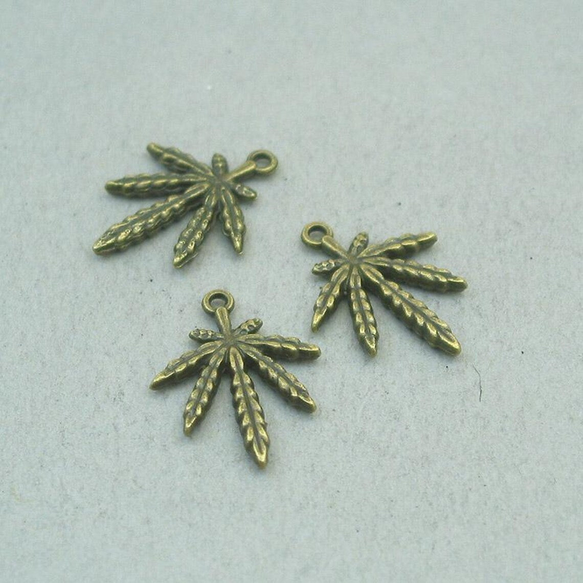 Weed charms, pot leaf pendants. Two sided. Antique bronze 18X24mm CM1624B