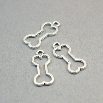 Dog bone charms, bone pendants. Two sided. Antique silver 11X25mm CM1240S