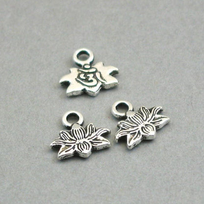 Lotus charms, lotus flower Om Yoga pendants. Two sided. Antique silver 10X10mm CM1145S