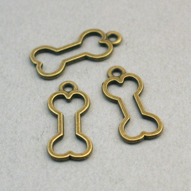 Dog bone charms, bone pendants. Two sided. Antique bronze 11X25mm CM1240B