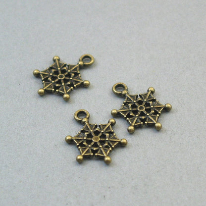 Snowflake charms, Snow pendants. Two sided. Antique bronze 14X20mm CM1282B