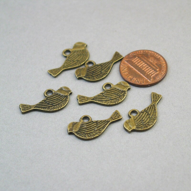 Bird charms, bird pendants. Two sided. Antique bronze 12X21mm CM1641B