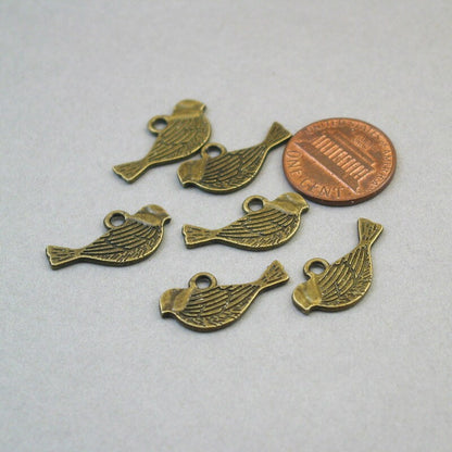 Bird charms, bird pendants. Two sided. Antique bronze 12X21mm CM1641B