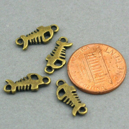 Fishbone charm connectors, fish skeleton link pendants. Two sided. Antique bronze 6X15mm CM0210B