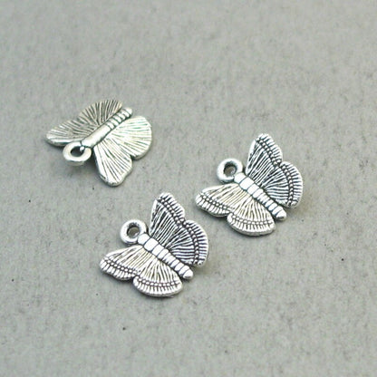 Butterfly charms, butterfly pendants. Two sided. Antique silver 13X12mm CM1848S