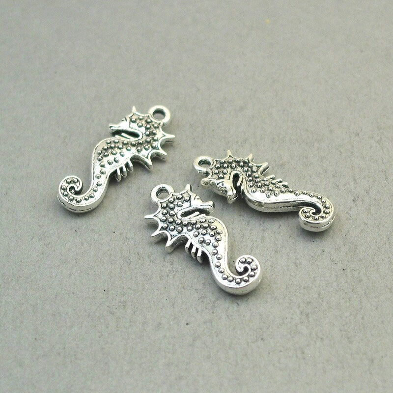 Seahorse charms, seahorse pendants. Two sided. Antique silver 12X28mm CM1855S