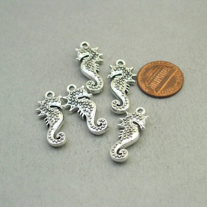 Seahorse charms, seahorse pendants. Two sided. Antique silver 12X28mm CM1855S