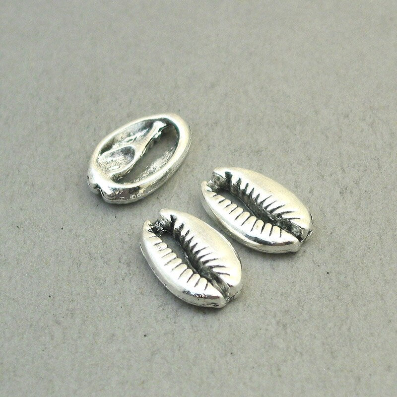 Shell charms, cowrie shell pendants. Two sided. Antique silver 12X19mm CM1859S