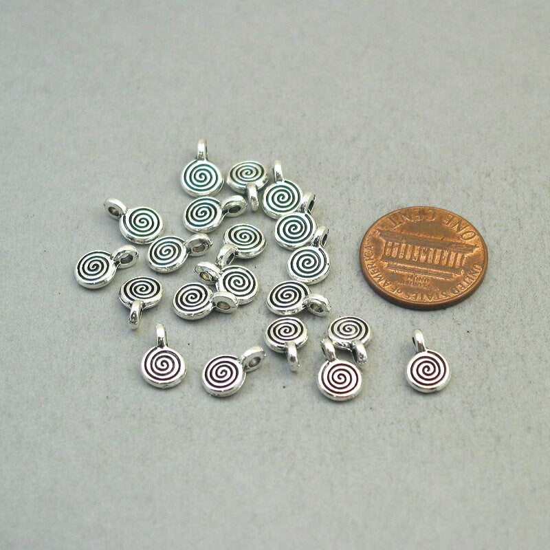 Swirl charms, small spiral disc pendans. Two sided. Antique silver 7X10mm CM1872S