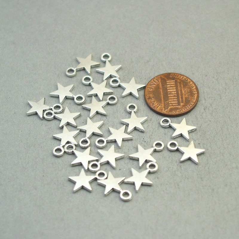 Star charms, star pendants, five point star. Two sided. Antique silver 9X13mm CM1874S