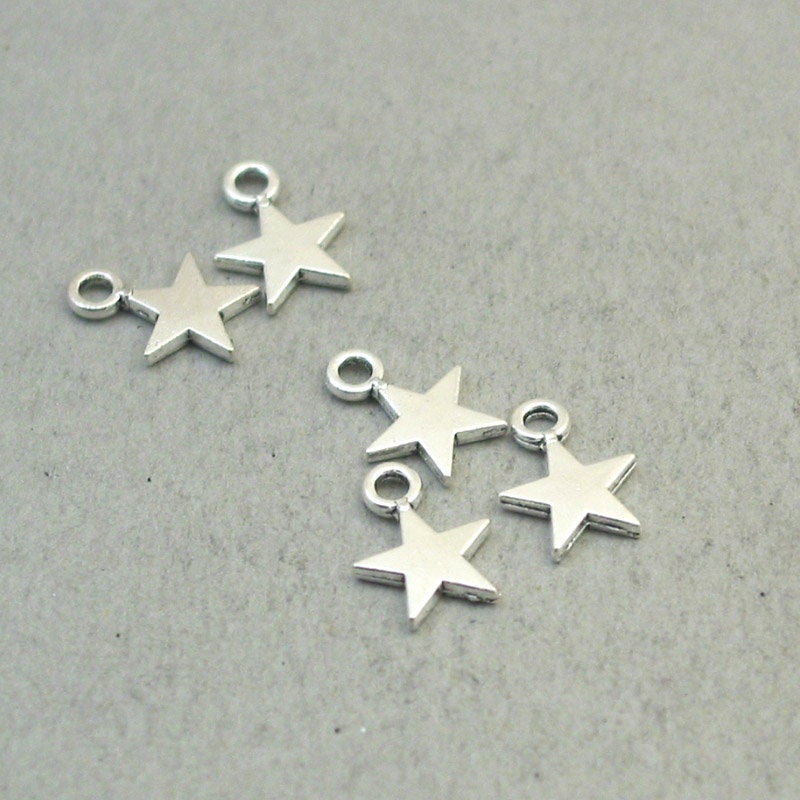 Star charms, star pendants, five point star. Two sided. Antique silver 9X13mm CM1874S