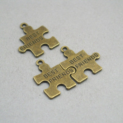 Best friends puzzle charms, friendship puzzle pendants. Two sided. Antique bronze 24X27mm CM1883B