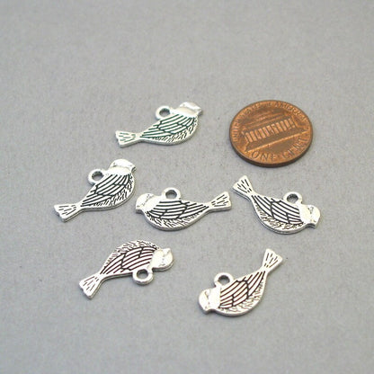 Bird charms, bird pendants. Two sided. Antique silver 12X21mm CM1641S