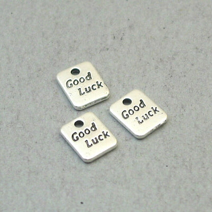 Good luck tag charms, small rectangle stamped tag pendants. Two sided. Antique silver 7X9mm CM1914S